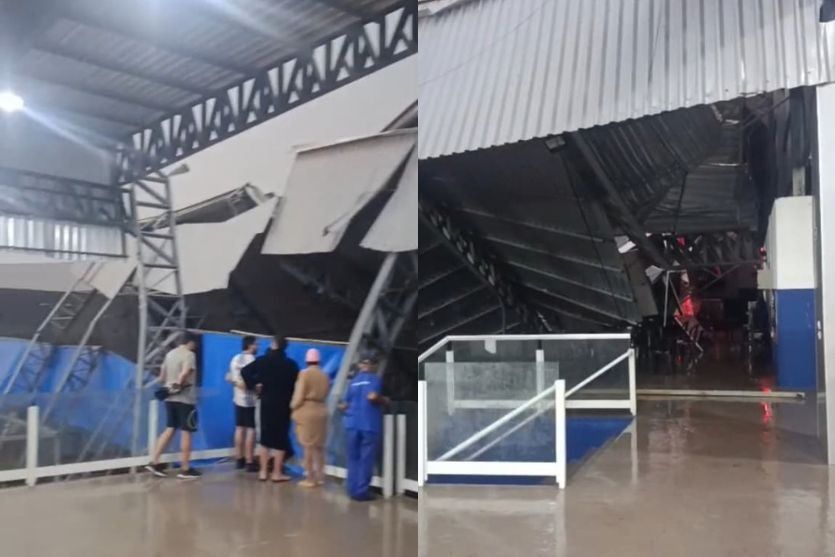 Cobertura de quadra de tênis desabada após temporal em Umuarama, com equipes de resgate no local.